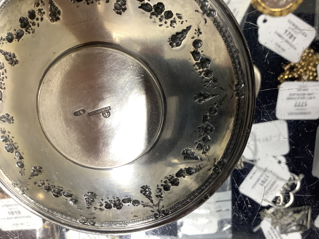 Two early 20th century Russian 84 zolotnik cups and saucers, one other saucer, napkin ring and sugar bowl